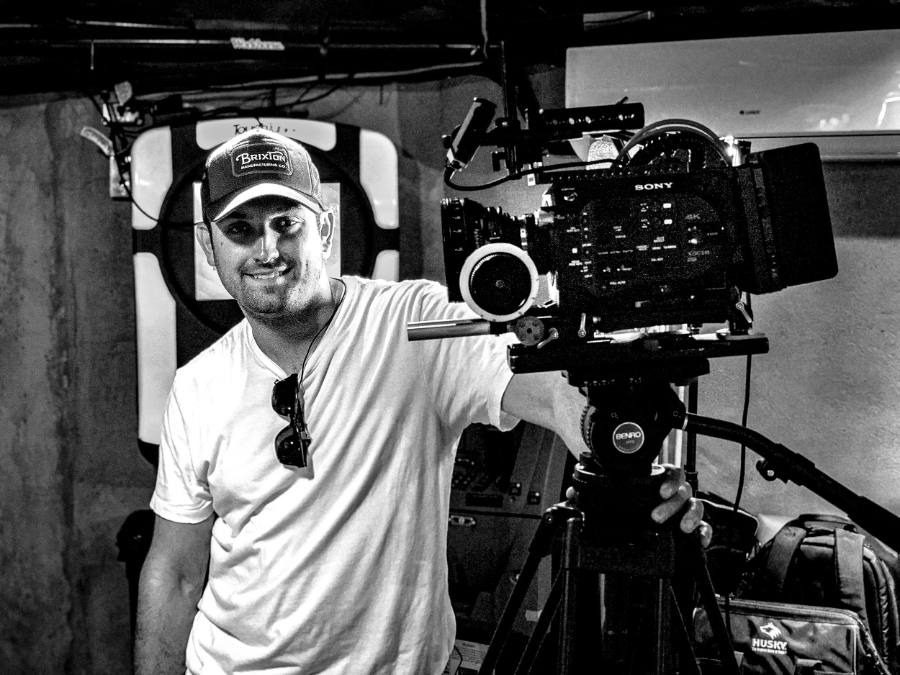 Matt Fox operating a camera on set