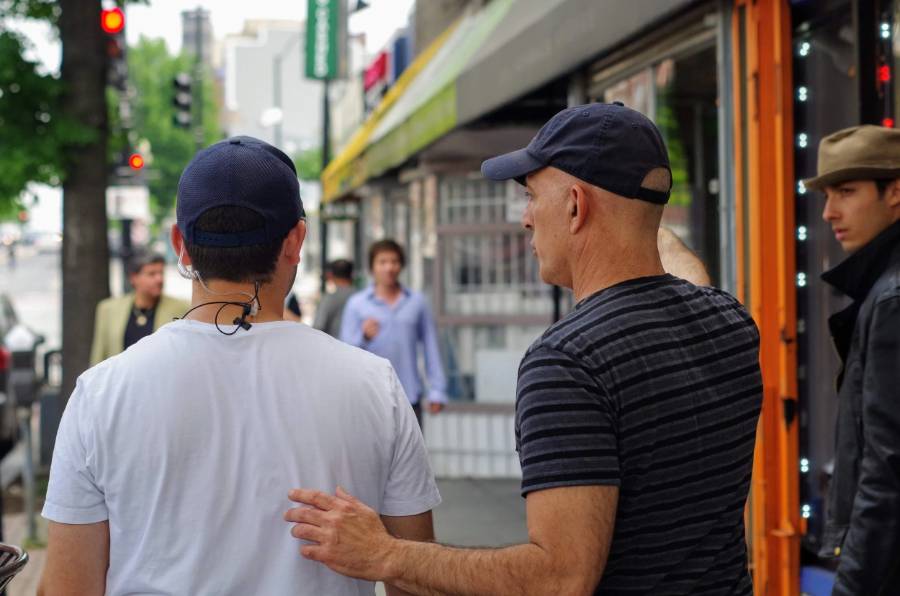 On-location crew and talent on a city street
